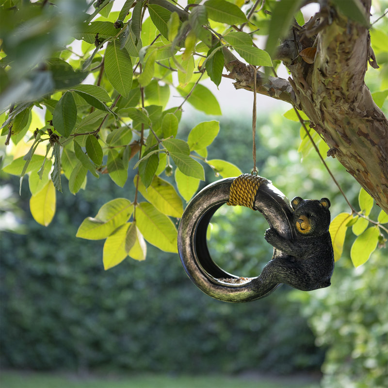 Loon Peak® Shoup Bear Swinging on Tire Decorative Bird Feeder & Reviews